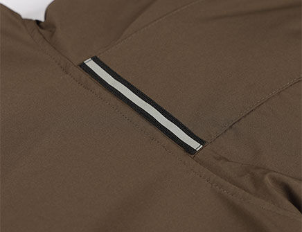 Reflective tap on neckline